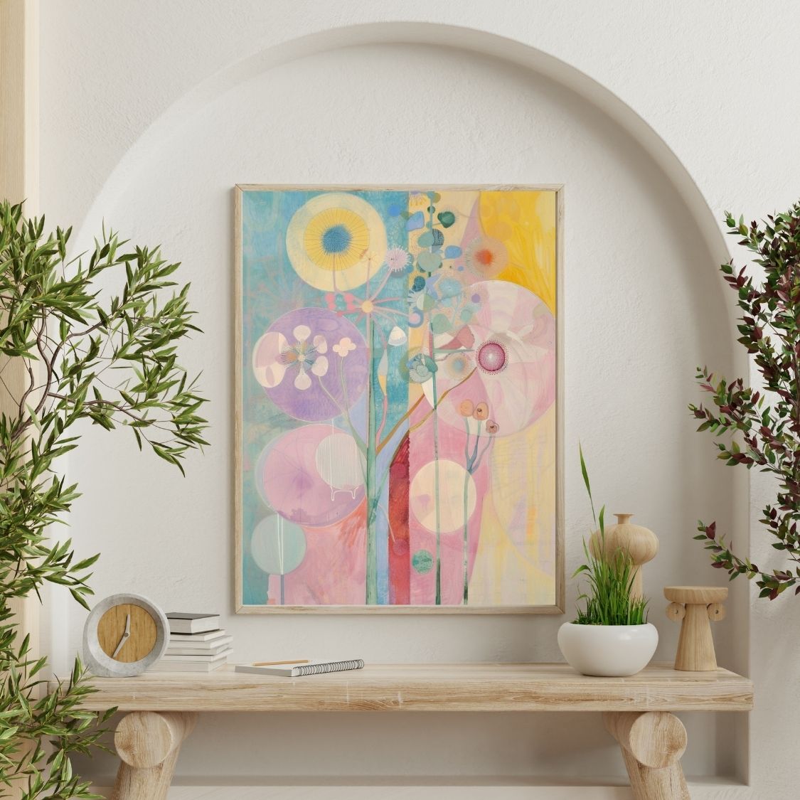 Poster wall art showing 'Blooming Softness – Floral Abstract in Pink and Neutral' on a wall surrounded by plants