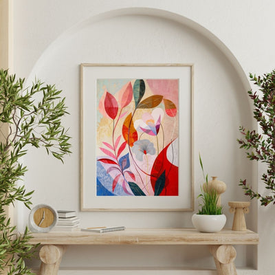 Poster wall art showing 'Blush Blossom – Pink Floral on Neutral Abstract' on a wall surrounded by plants