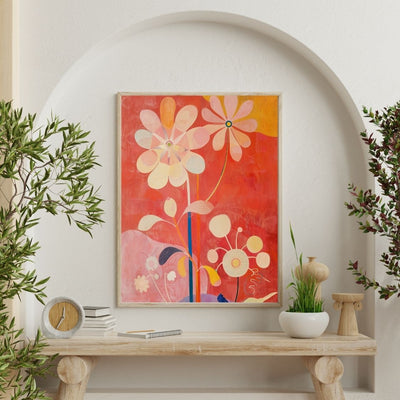 Poster wall art showing 'Bold Botanicals – Vibrant Art Flowers' on a wall surrounded by plants