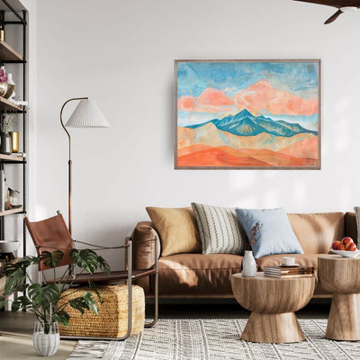 Poster wall art showing 'Clouds Over the Crest – Dramatic Mountain Pass' in a living room