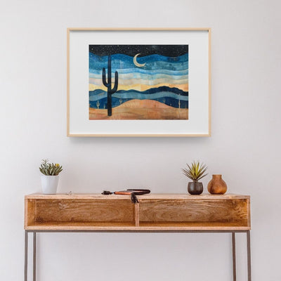 Poster wall art showing 'Desert Starscape – Cactus Under a Starry Sky' in a hallway