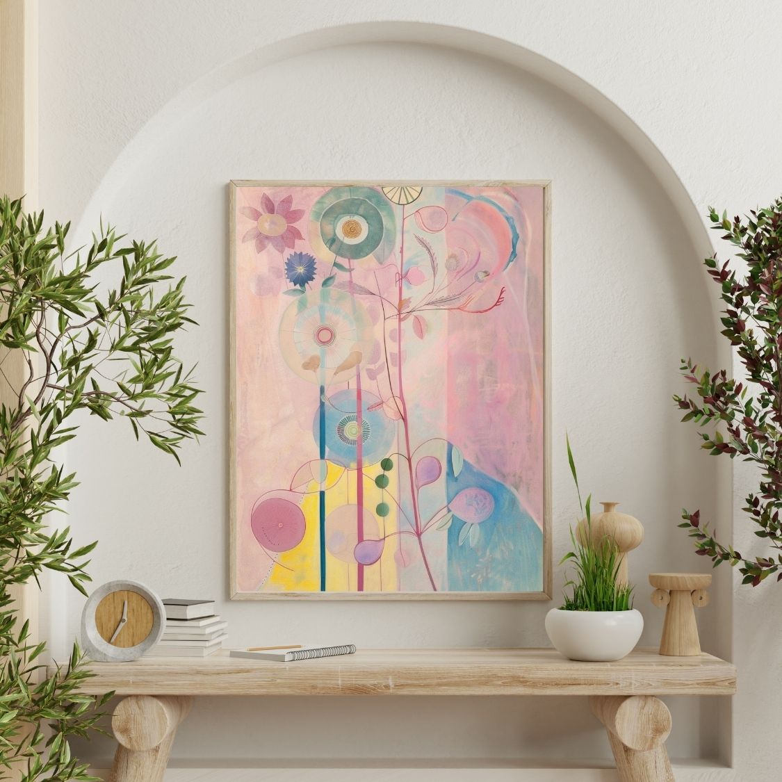 Poster wall art showing 'Floral Mystique – Pink Tones in Neutral Canvas' on a wall surrounded by plants