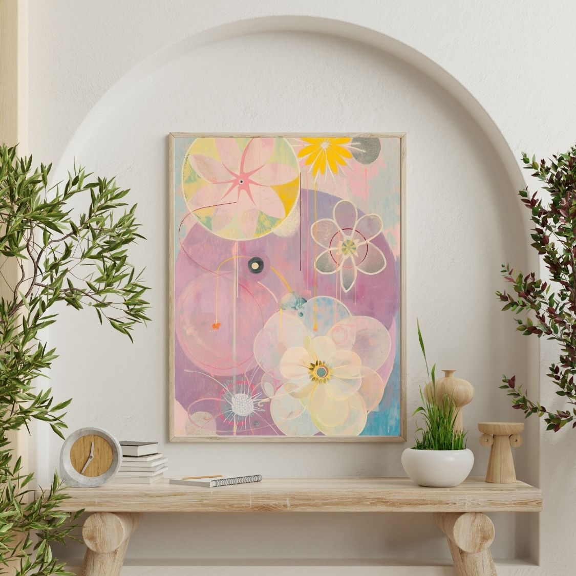 Poster wall art showing 'Petal Hues – Neutral and Pink Flower Motifs' on a wall surrounded by plants