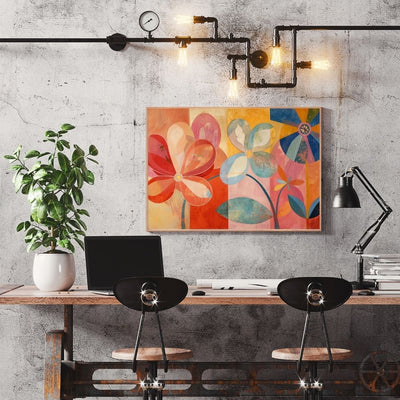 Poster wall art showing 'Radiant Bloom – Bold Bright Floral Art' in a home office